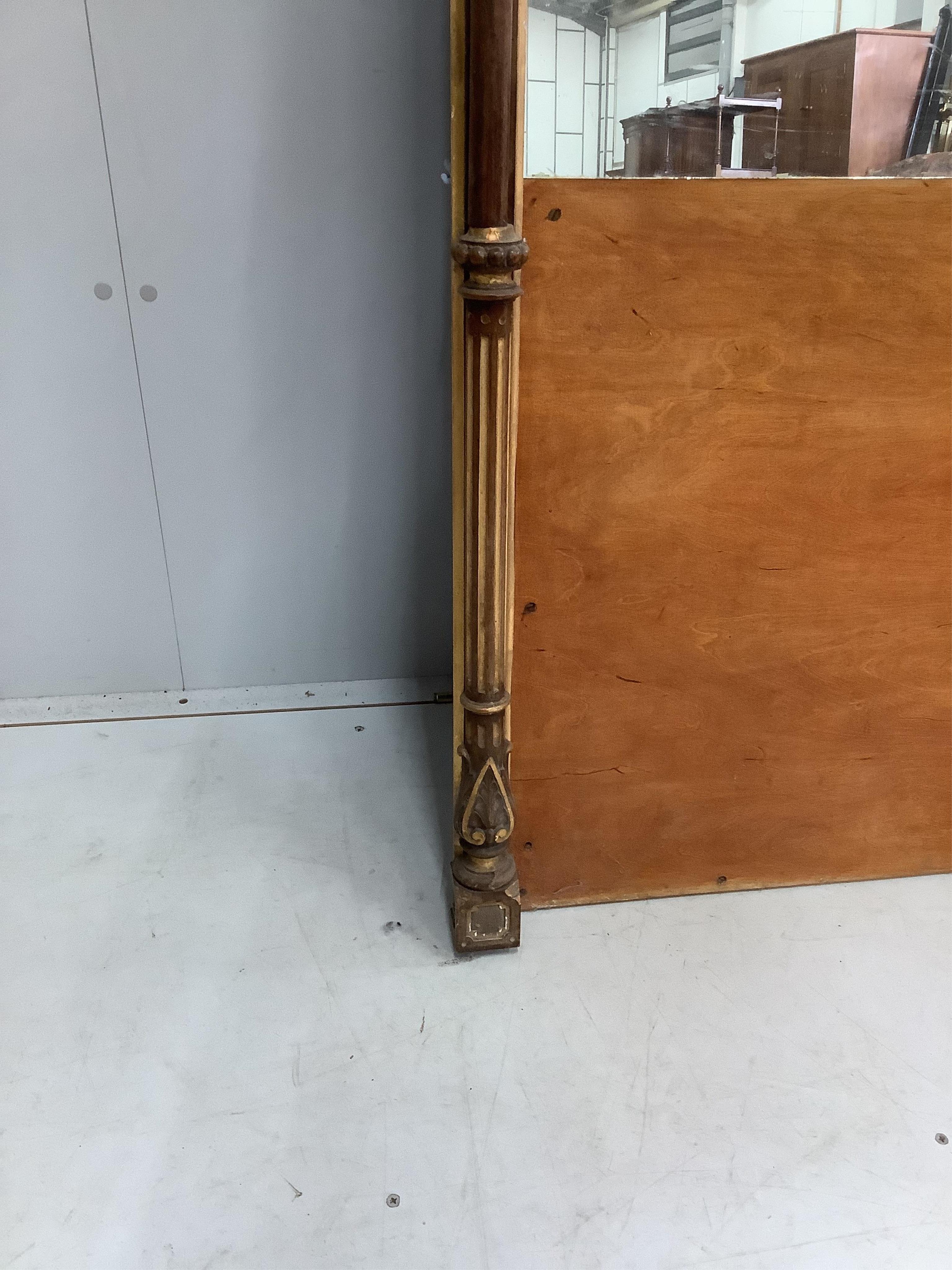 A Victorian parcel-gilt mahogany overmantel mirror, with partial plate, width 146cm, height 206cm. Condition - fair